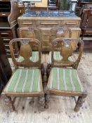 1920's carved oak Lees style two door sideboard and set of four similar dining chairs.