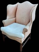 Georgian style wing armchair with serpentine front seat.