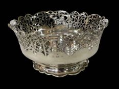 Handsome silver bowl with deep pierced rim and on shaped foot, Birmingham 1937, 23.5cm diameter.