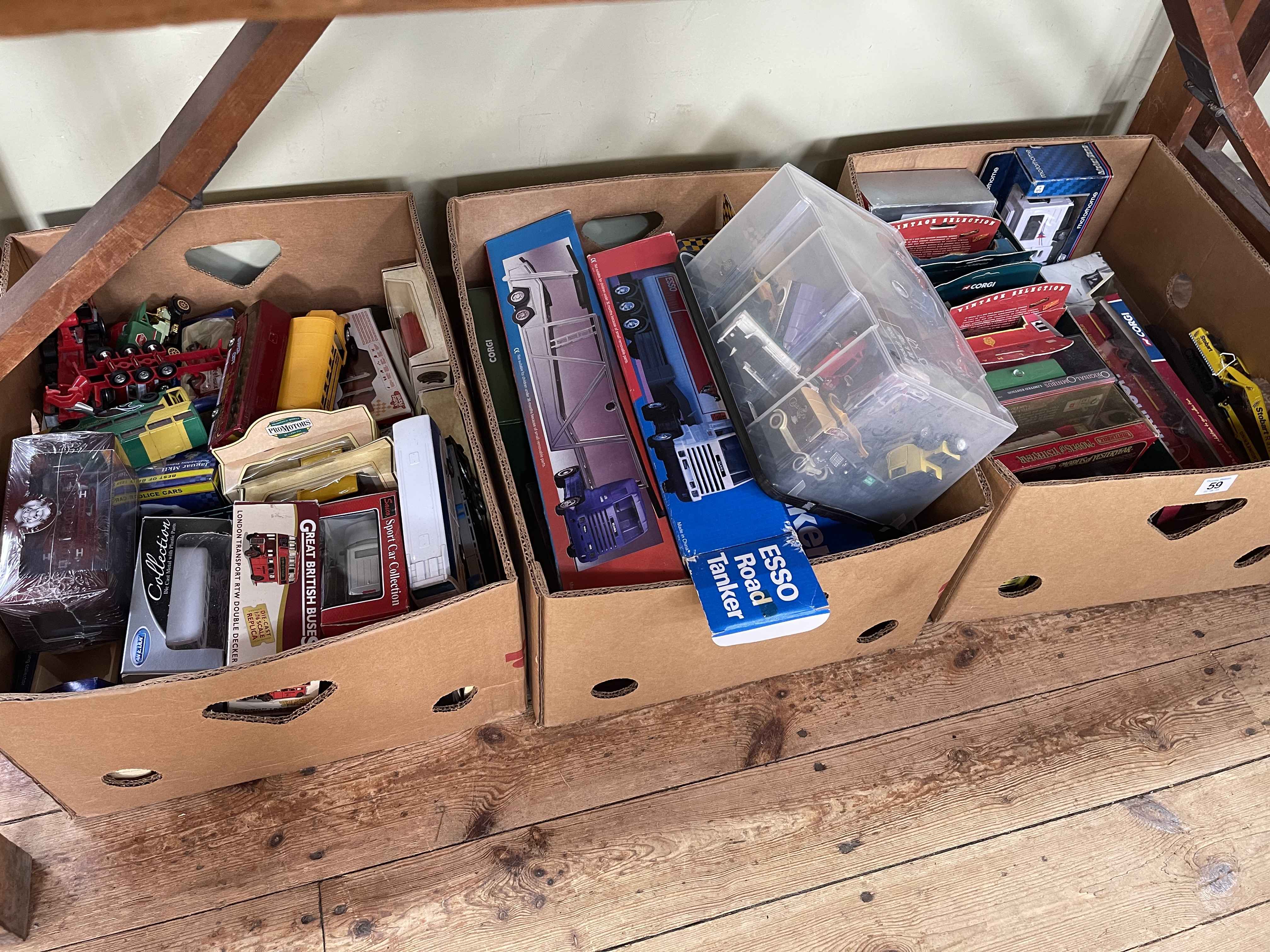 Three boxes of Diecast toy vehicles including Corgi, Matchbox, etc.