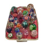 Collection of glass paperweights.