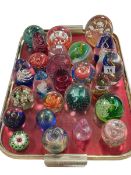Collection of glass paperweights.