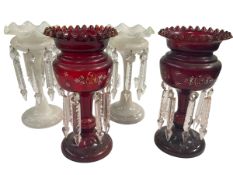 Two pairs of Victorian glass lustres.