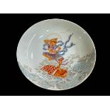 Chinese saucer dish with figure riding a turtle at sea, seal mark, 13.5cm.