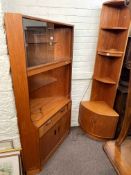 Two G Plan teak corner cabinets.