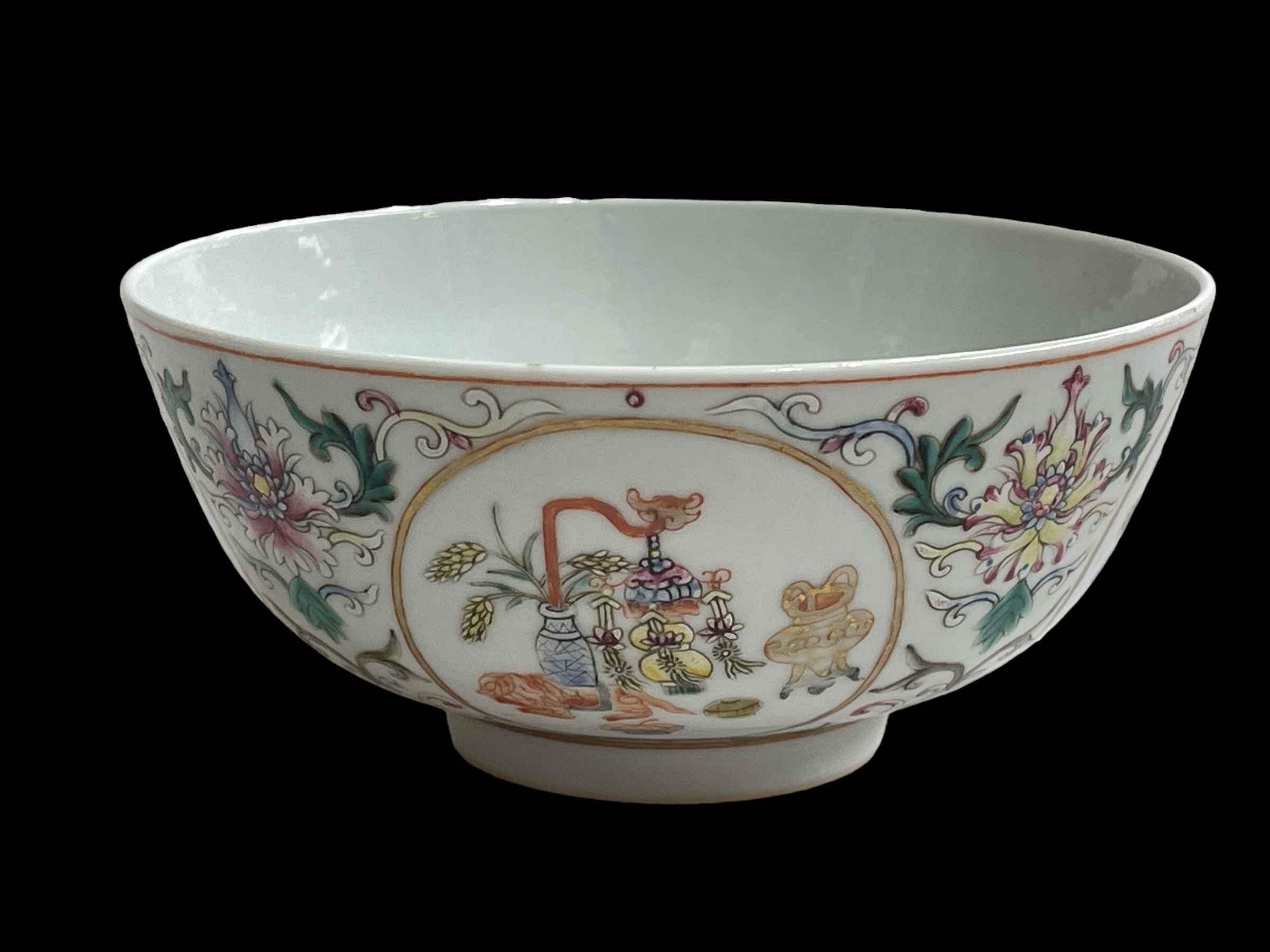 Chinese famille rose bowl with panels of artifacts, seal mark, 14cm diameter.