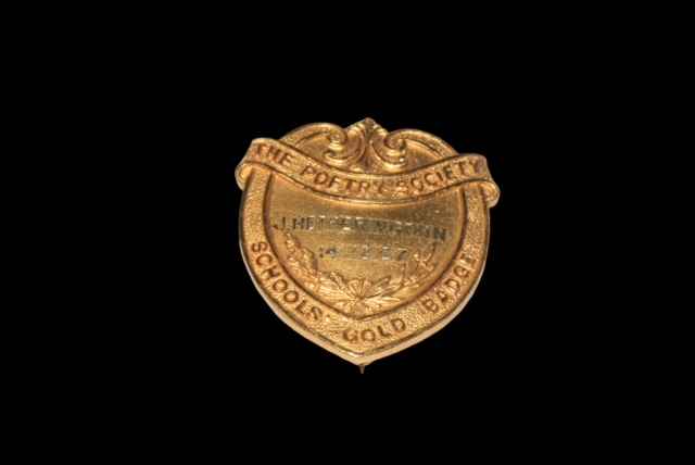 Silver gilt 'School Poetry Society' badge.