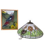 Stained glass light shade and a parrot stained glass panel.
