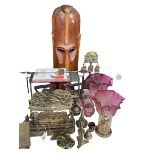 Large carved wood tribal mask, four ruby glass oil lamp shades, brass ware, etc.