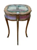 Continental gilt and brass mounted shaped top bijouterie table, 74cm by 52cm by 52cm.