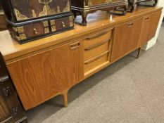 Vintage teak cocktail sideboard, 77cm by 219.5cm by 45cm.