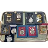 Collection of nine modern pocket watches.
