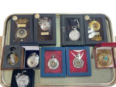 Collection of nine modern pocket watches.