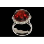 Impressive garnet and diamond 18 carat white gold ring, the large (1.8 by 1.