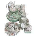 Approximately fifty pieces of Minton Haddon Hall tableware including cake stand,