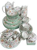 Approximately fifty pieces of Minton Haddon Hall tableware including cake stand,