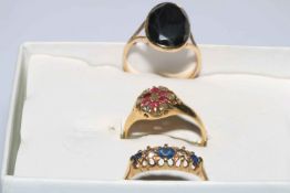 18 carat gold, ruby and diamond ring, 9 carat gold gem set ring, and unmarked ring (3).