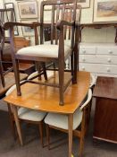 Vintage teak extending dining table and four chairs and two oak carver chairs (7).