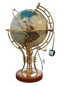 Illuminated globe on gilt metal stand, 70cm high.