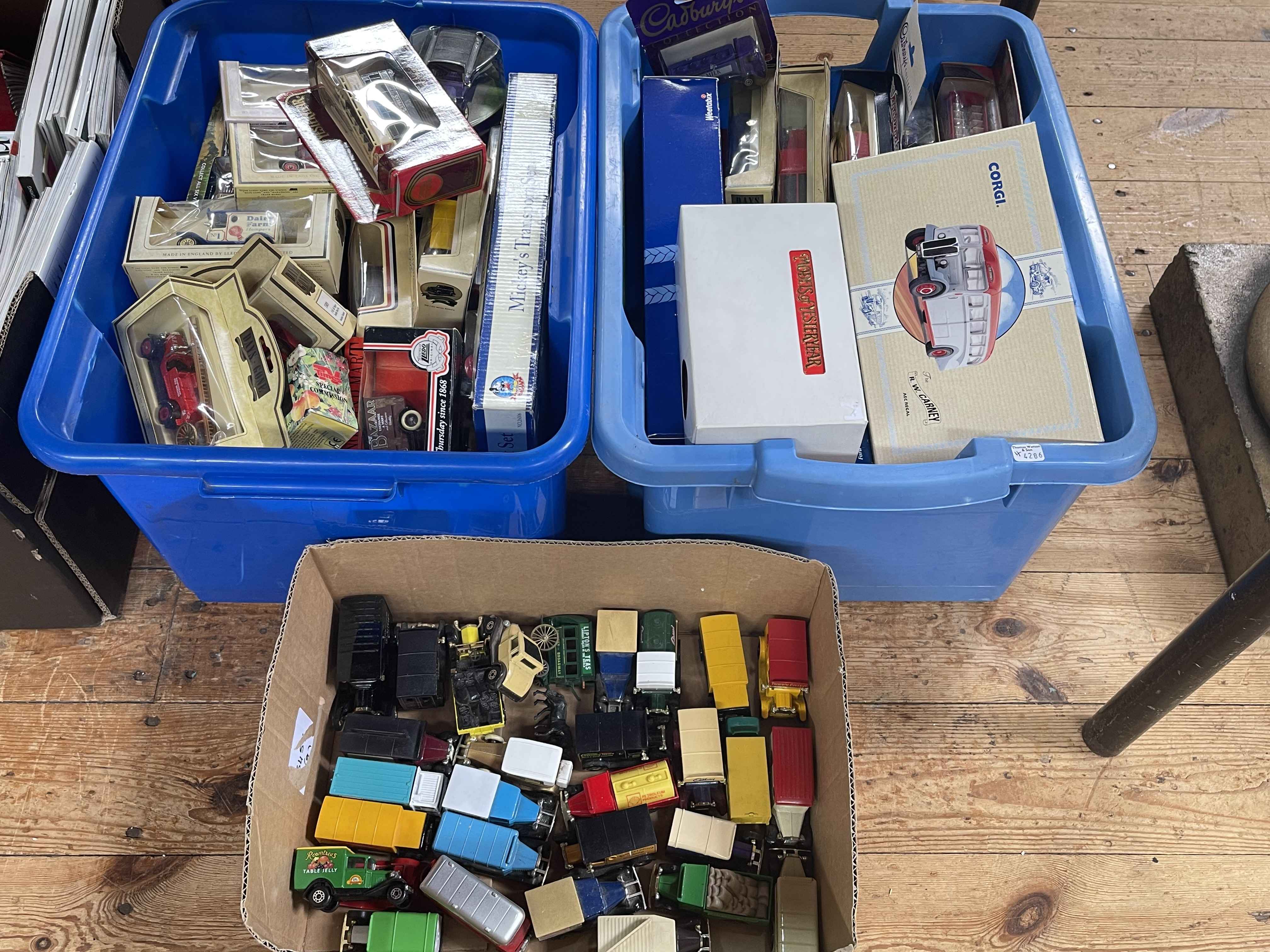 Three boxes of model vehicles including Corgi, boxed and loose.