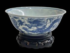 Chinese blue and white five claw dragon bowl, with stand, six character mark, 14cm diameter.