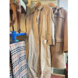 Collection of Burberry and Burberry style clothing.