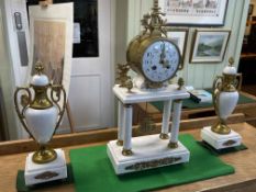 Ornate marble and gilt metal three piece clock garniture.