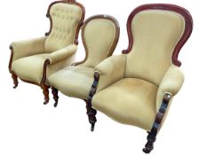 Three Victorian mahogany framed chairs in matching fabric to include two arm and one nursing.