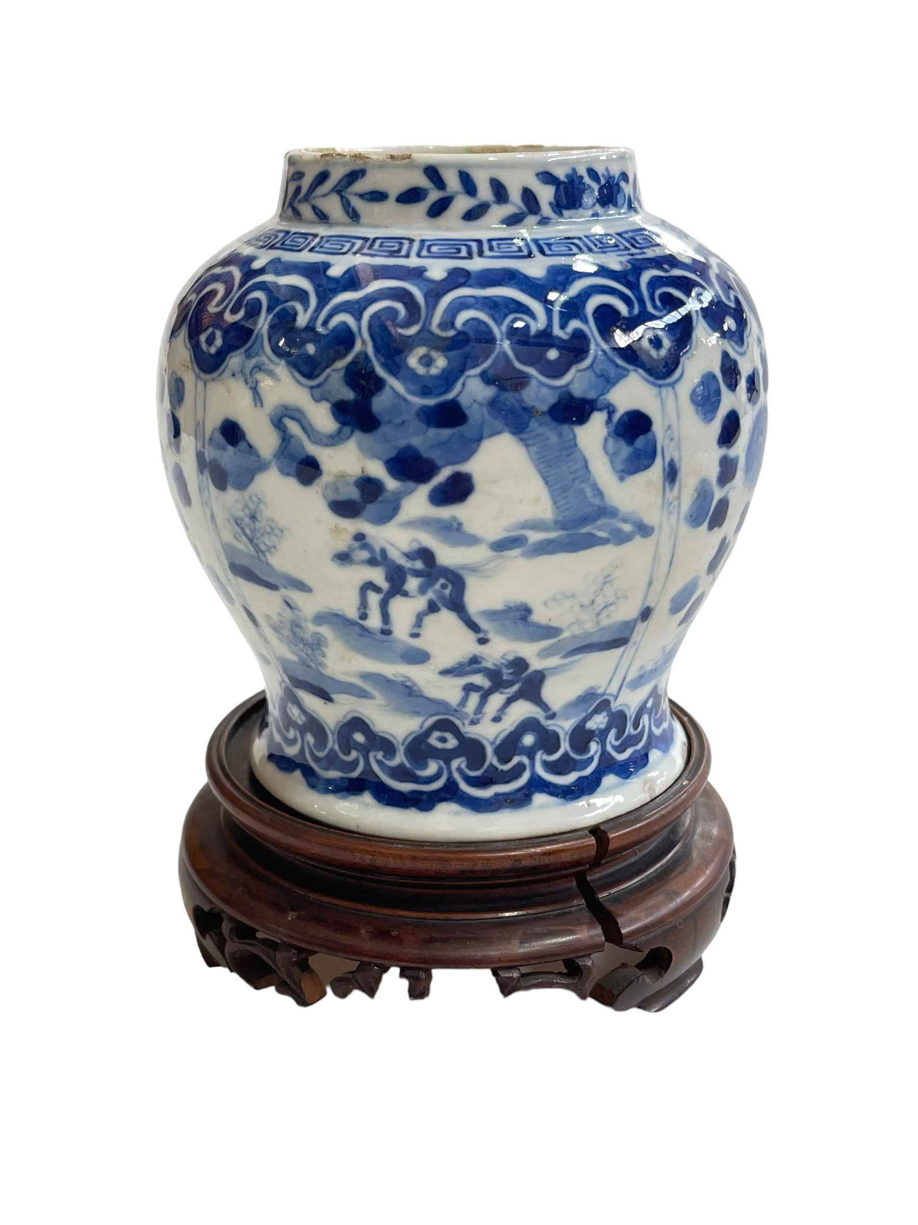 Chinese porcelain blue and white vase on wood stand decorated with horses and riders in landscape, - Image 2 of 3