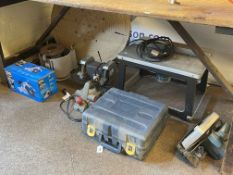 Collection of power tools including Pro Router, electric planer, belt sander, bench grinder,