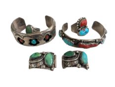 Collection of sterling silver bangles, rings and buckles, with turquoise and coral.