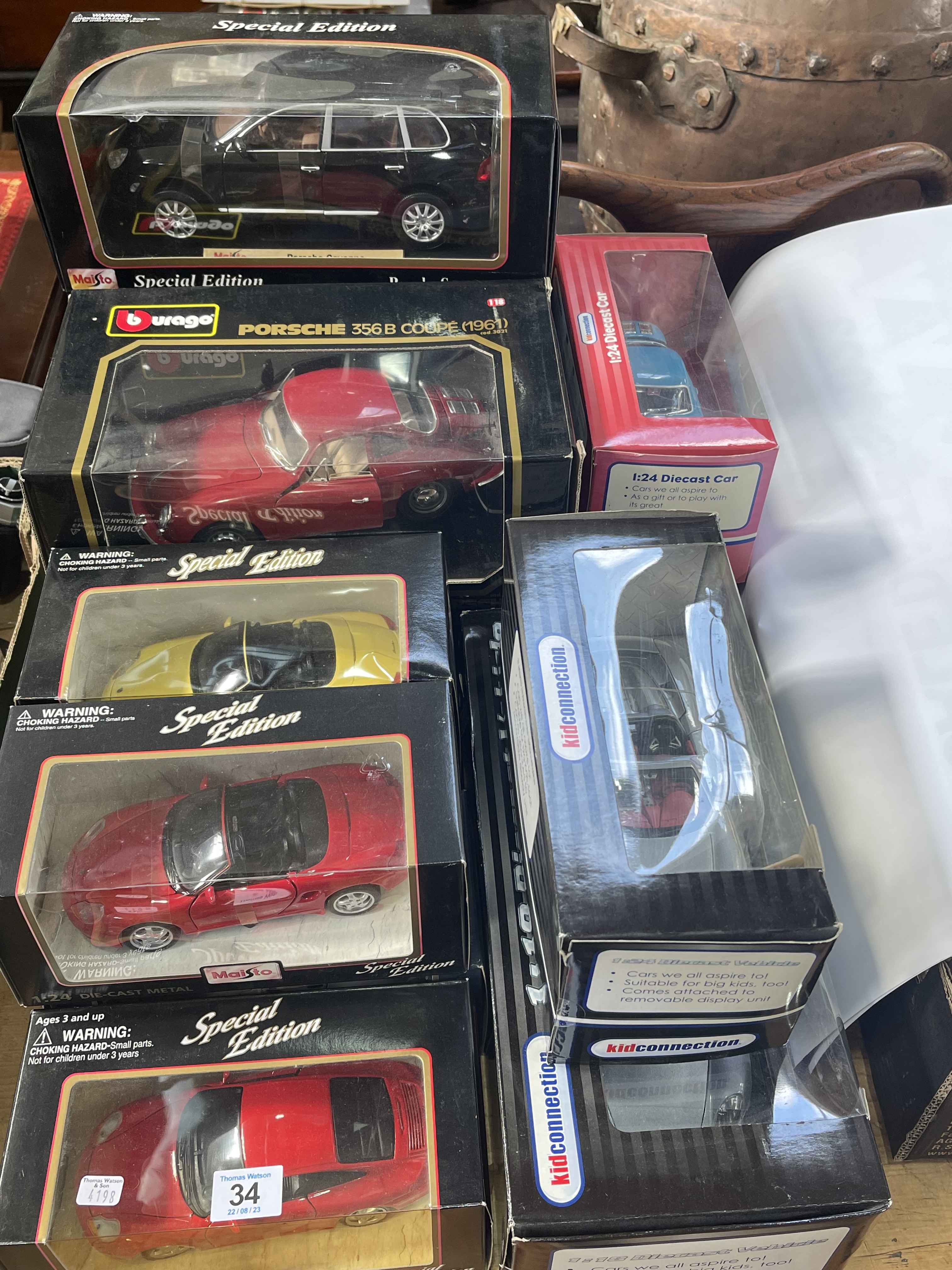 Collection of boxed Diecast toy vehicle including Burago, Maisto, etc.