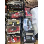 Collection of boxed Diecast toy vehicle including Burago, Maisto, etc.