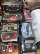 Collection of boxed Diecast toy vehicle including Burago, Maisto, etc.