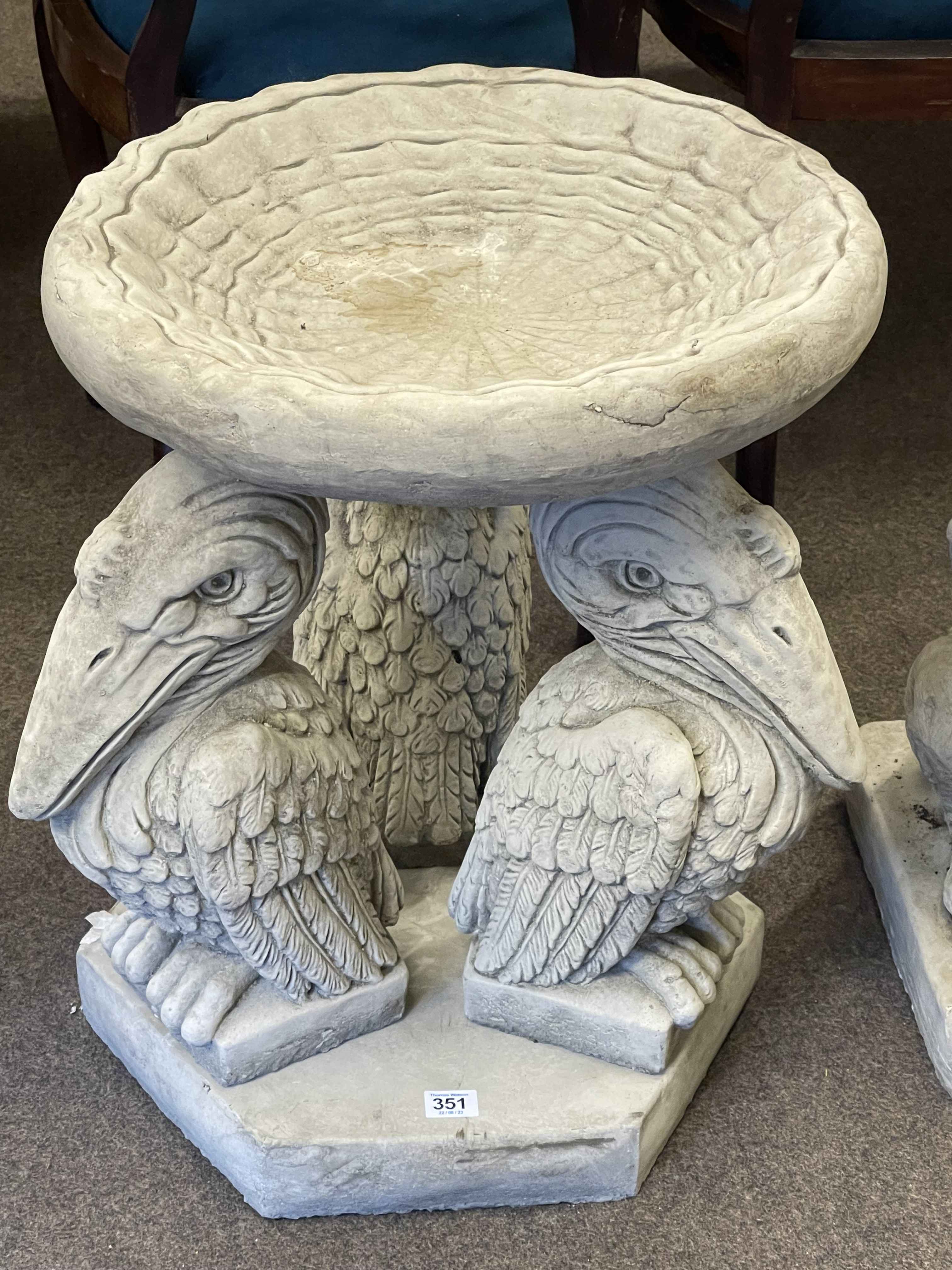 Triple Pelican figure bird bath, 56cm.