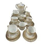 Minton Jubilee Gold and white tea service, 36 pieces.