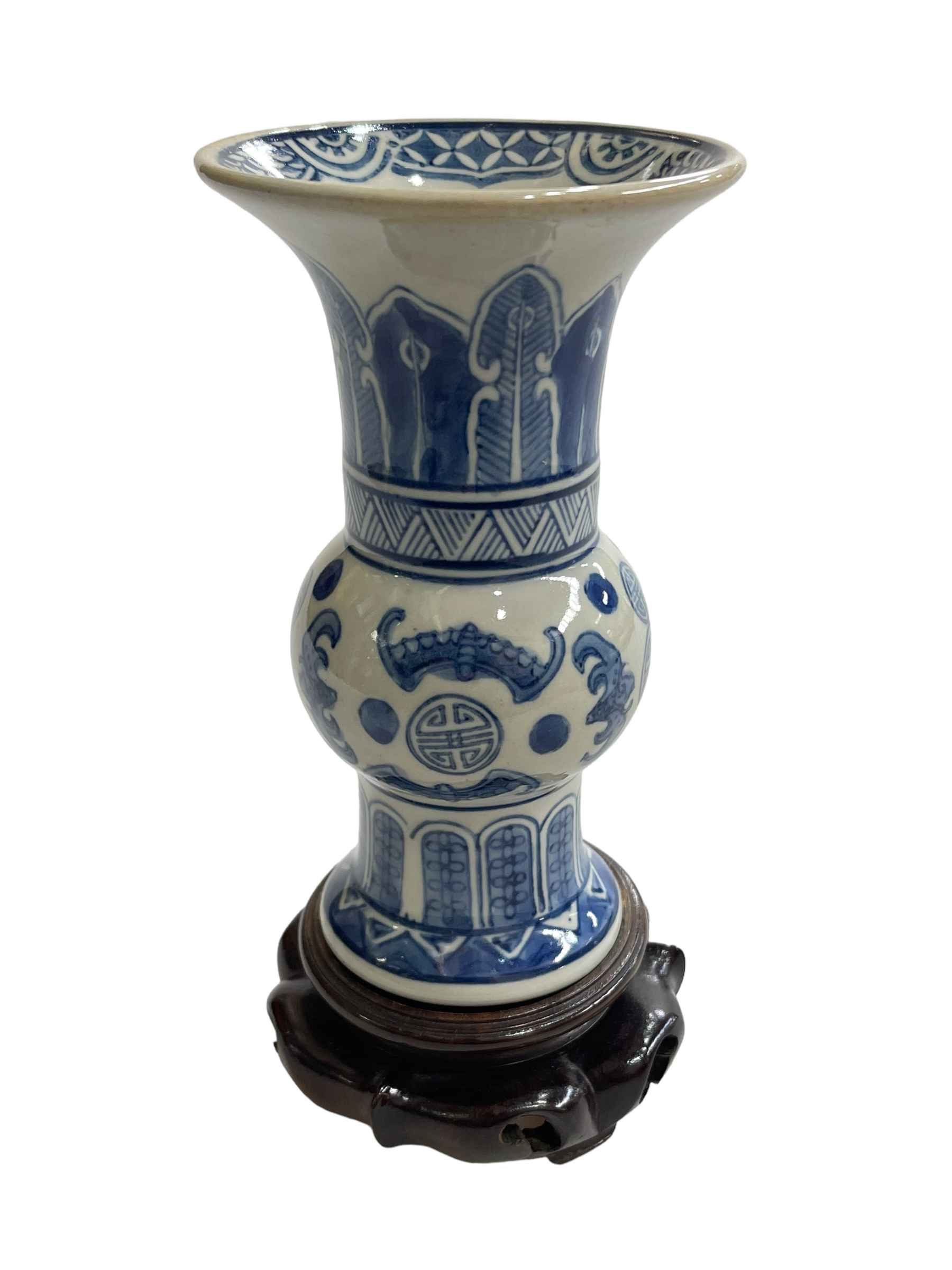 Chinese porcelain vase decorated with bats and symmetrical pattern, on wood stand, 19cm.