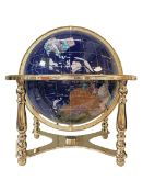 Semi-precious stone globe on brass stand, 43cm high.