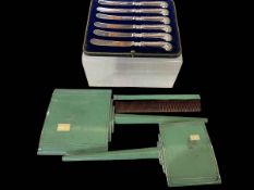 Cased set of silver pistol grip tea knives, and Art Deco brush set.