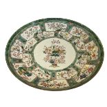 Large antique Chinese famille verte plaque with foliate decoration, 45.5cm diameter.