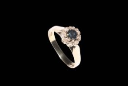 Sapphire and diamond 9 carat white gold ring, size M.