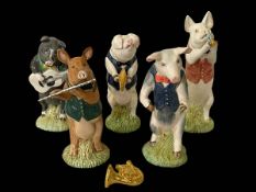 Five Beswick Piggy Band figures.