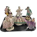 Five Continental porcelain extravagant figures, and Paragon Elise figure.