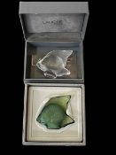Two boxed Lalique fish.