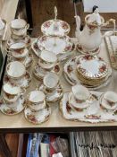 Royal Albert Country Roses china with coffee pot and cake stand, 50 pieces.