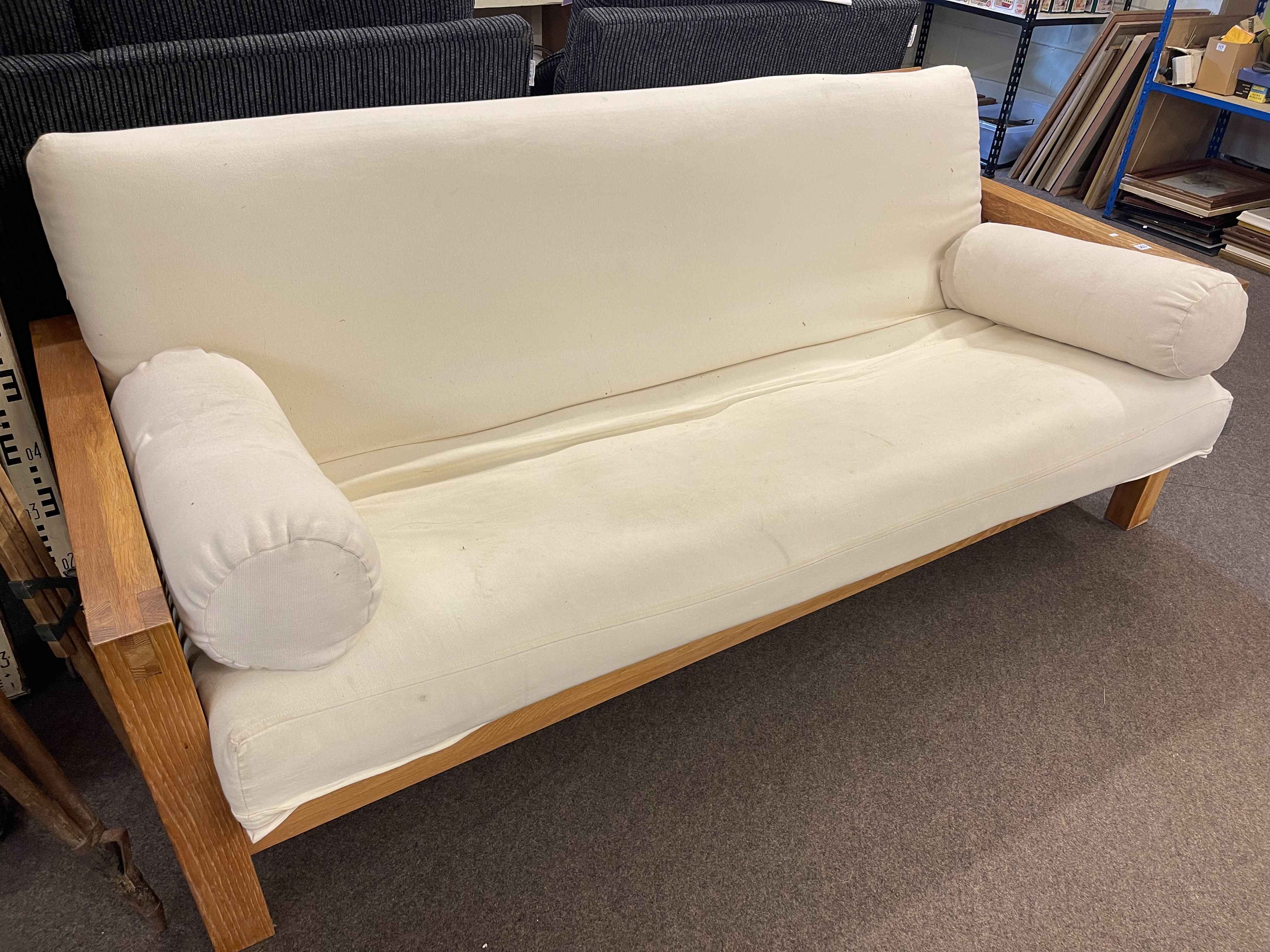 Large wooden framed futon, 205cm by 90cm.