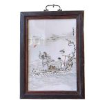 Small Chinese porcelain panel in wood frame decorated with figures in naturalistic wood boat,