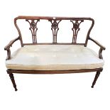 Edwardian mahogany line inlay sofa on turned legs, 120cm wide.