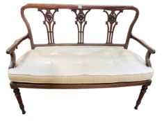 Edwardian mahogany line inlay sofa on turned legs, 120cm wide.