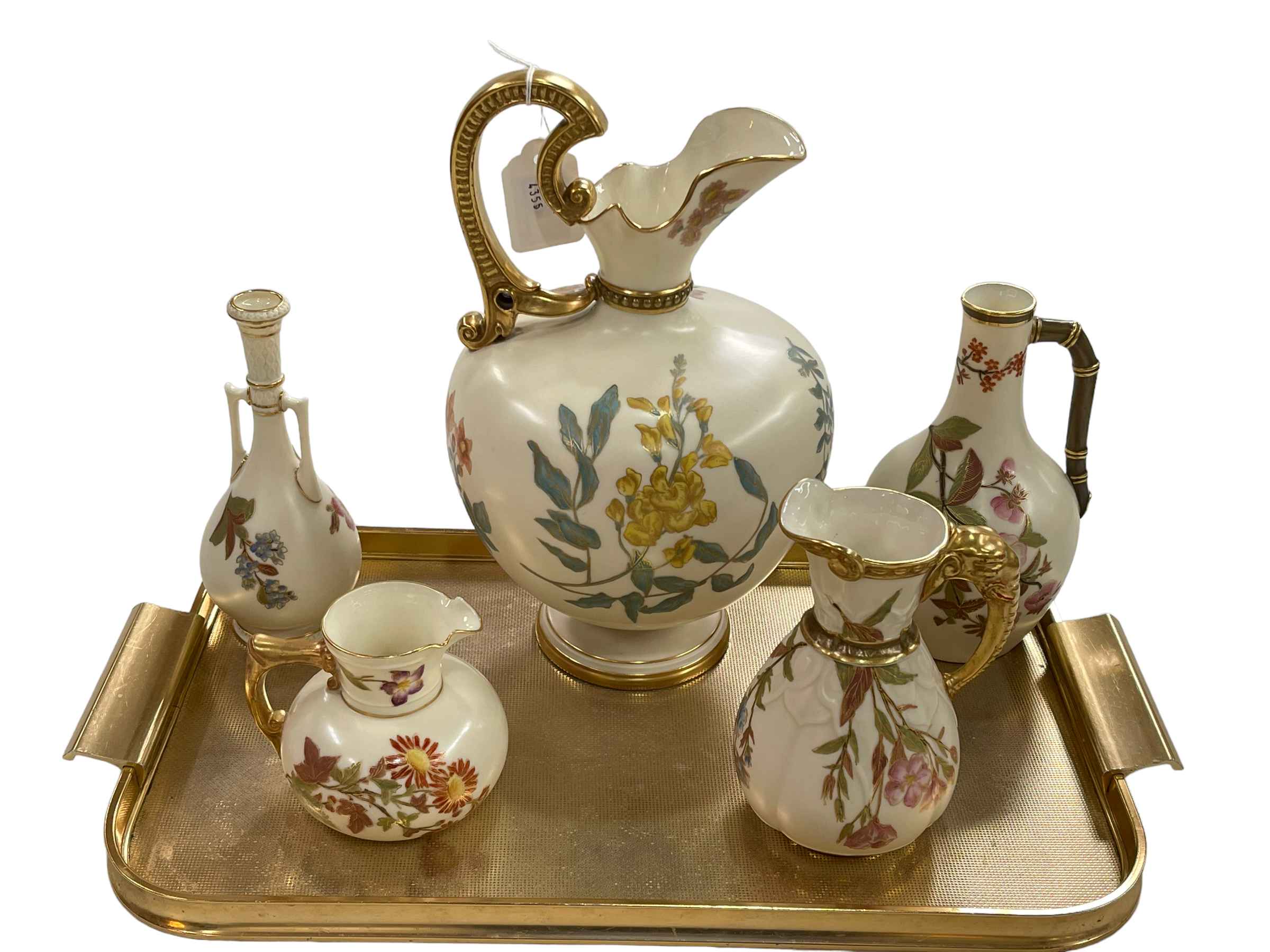 Large Royal Worcester ewer and four smaller pieces with foliate on ivory ground.